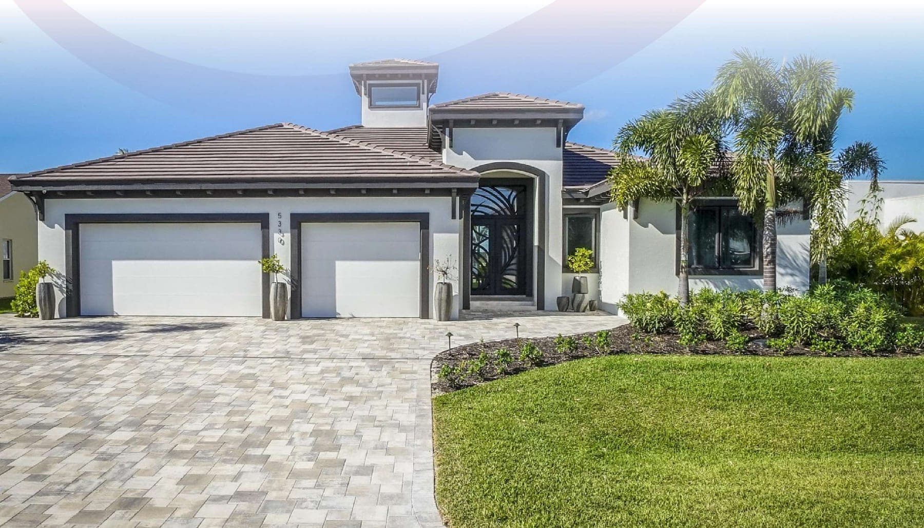 The Landmark custom home front elevation by Koogler Homes, Cape Coral, FL