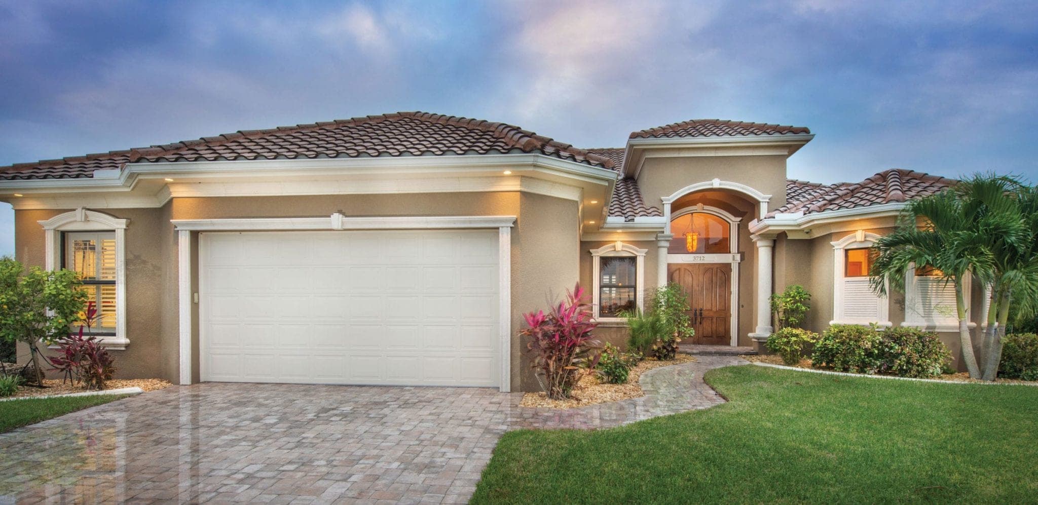 The Tobago custom home front elevation by Koogler Homes, Cape Coral, FL