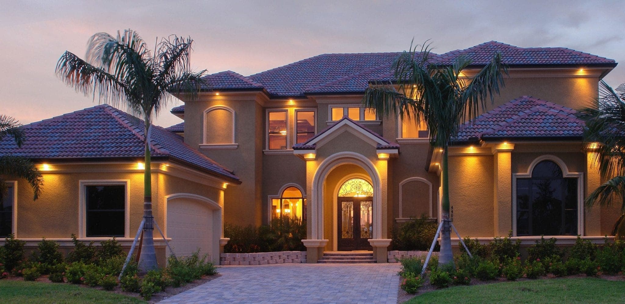 The Villa Centinale custom home front elevation by Koogler Homes, Cape Coral, FL