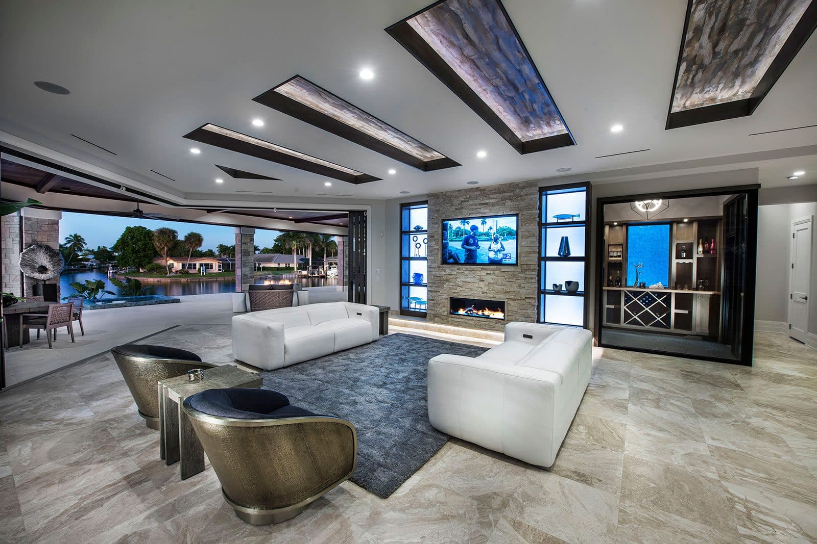 Open great room with water views in a Koogler Homes custom home, Cape Coral, FL