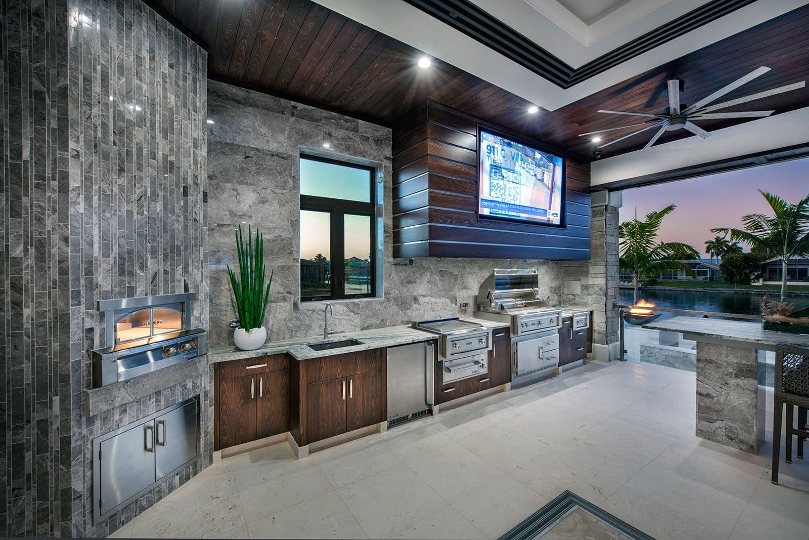 Outdoor kitchen on the lanai of a Koogler Homes custom home, Cape Coral, FL